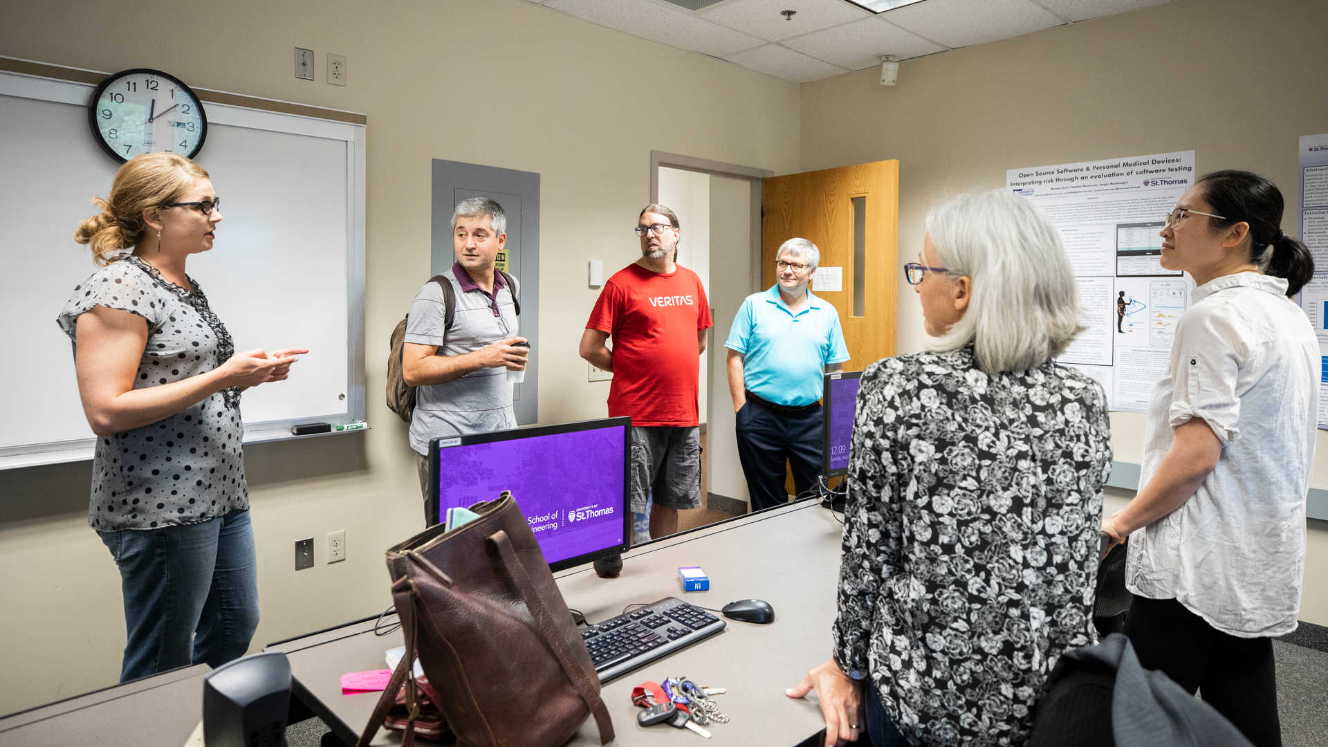 Graduate Programs in Software students present their research to one another and faculty members.